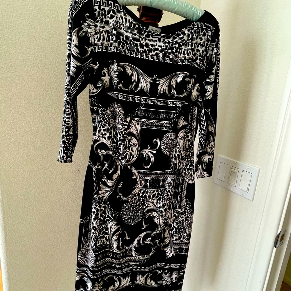 Size 2 black,white, silver snd gray cache dress with sleeves